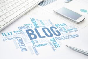 The word blog written in uppercase large letters surrounded by blog concepts like text, tags, categories, content , images etc ... written in smaller letters.